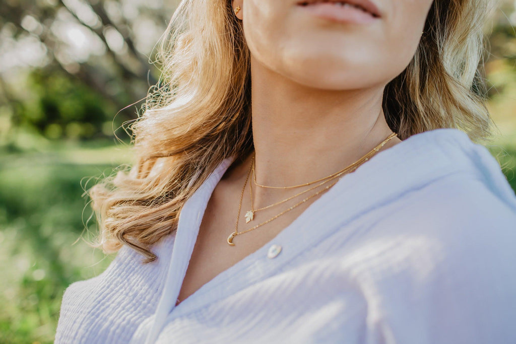 Simplistic Gold Necklace With Crescent Moon Pendant